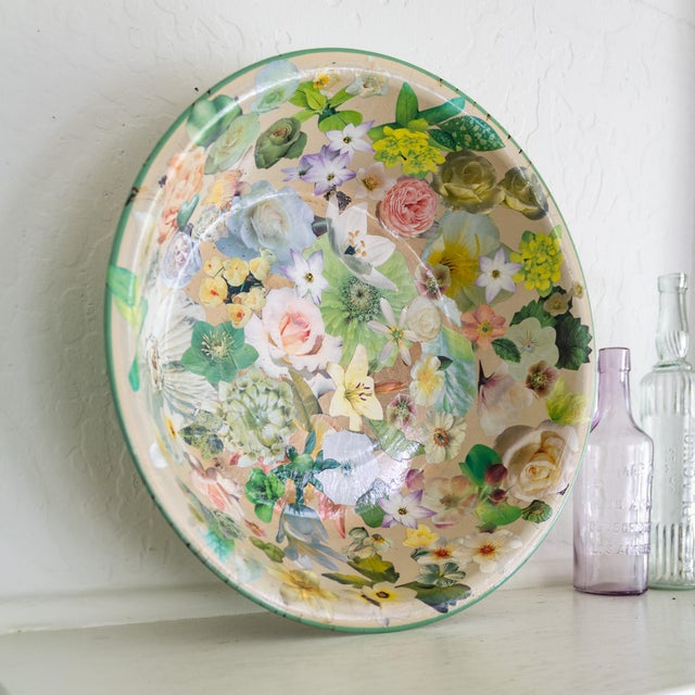 A vintage enamelware bowl customized with bright floral decoupage inside and out. The original 1940s bowl is a soft...