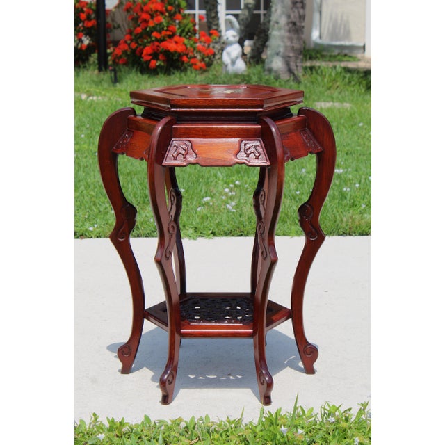 Bring timeless Asian elegance into your home with this beautiful vintage Chinese hexagonal plant stand or display...