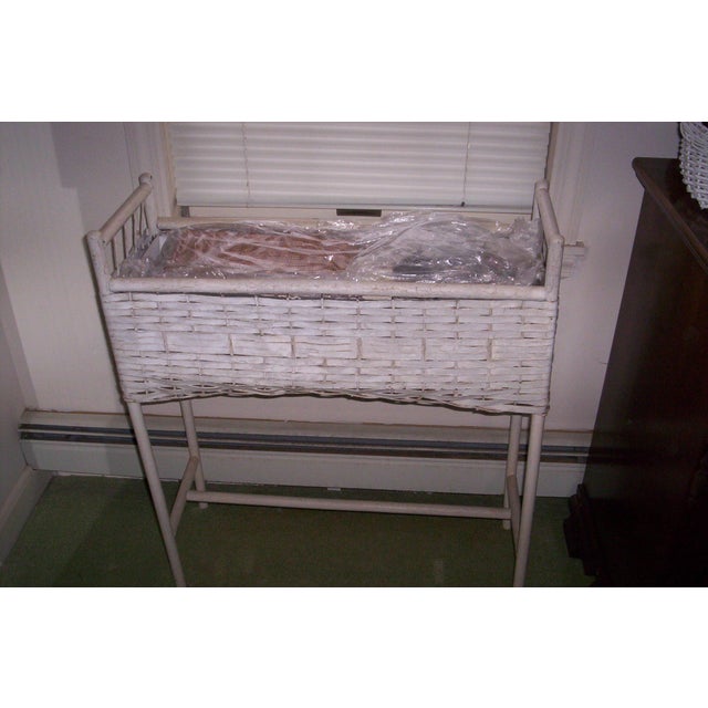 1930's White Wicker Planter with solid wood case and Zinc metal liner, approx. 36" Wide by 24" High by 10' Deep. The woven...