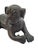 This charming, solid bronze sculpture depicts a recumbent pug or bulldog puppy, rendered with expressive detail and...