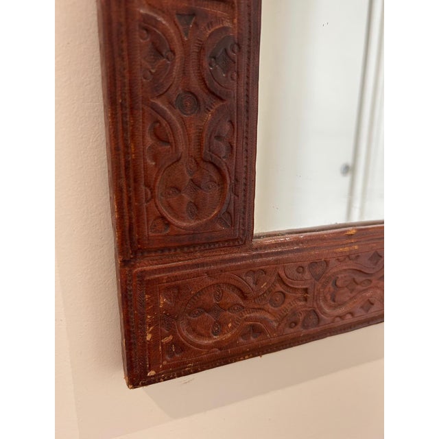 embossed leather mirror from the 1970s