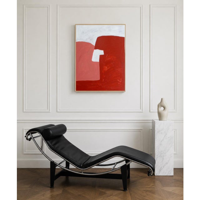 An abstract composition with soft, organic lines, where two red forms seem to meet in silent equilibrium. The terracotta...