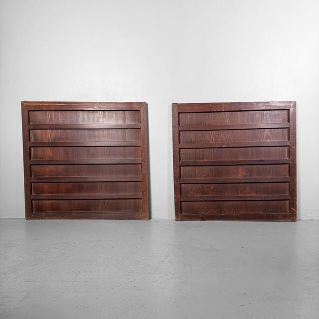 This set of two Japanese wooden door panels, originally from a piece of furniture, has a strong yet calm presence thanks...