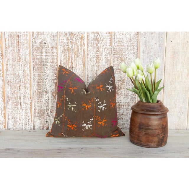 This colorful and luxurious Bagh Phulkari pillow features beautiful hand-done silk embroidery on top of a cotton fabric....