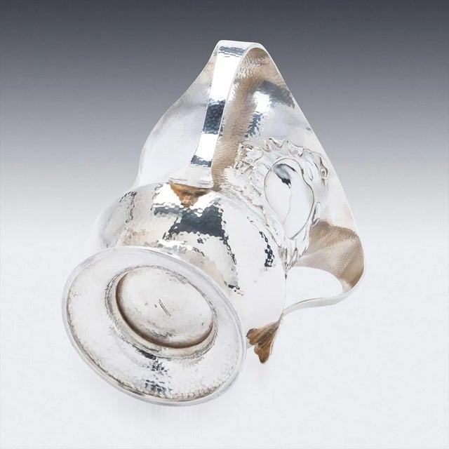 Antique early-20th Century Edwardian Arts and Crafts solid silver pair of wine coolers, each raised on a circular...