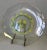 Very rare 1960's vintage round glass serving dish. The multi-color daisy and picket fence pattern has varying shades of...