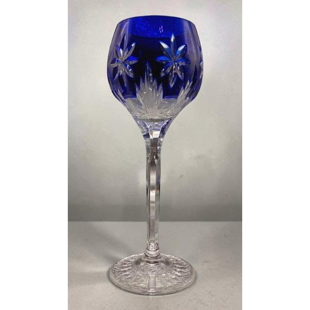 Striking set of four vintage “The Stars of Midnight” cobalt blue crystal wine glasses designed by Horst Belda for Franklin...