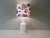 Large white glazed ceramic table lamp with a new professionally handmade lampshade with Ralph Lauren floral fabric. The...