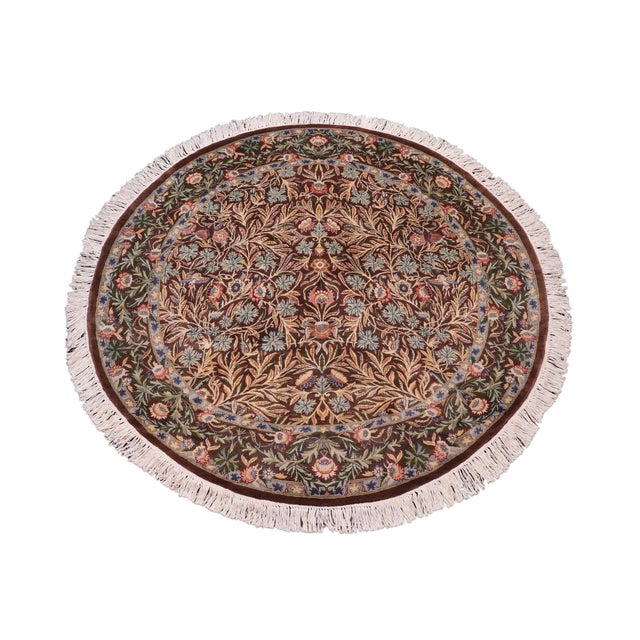 This hand‑knotted Pak Persian round rug showcases the finest expression of traditional Persian artistry. Each piece is...