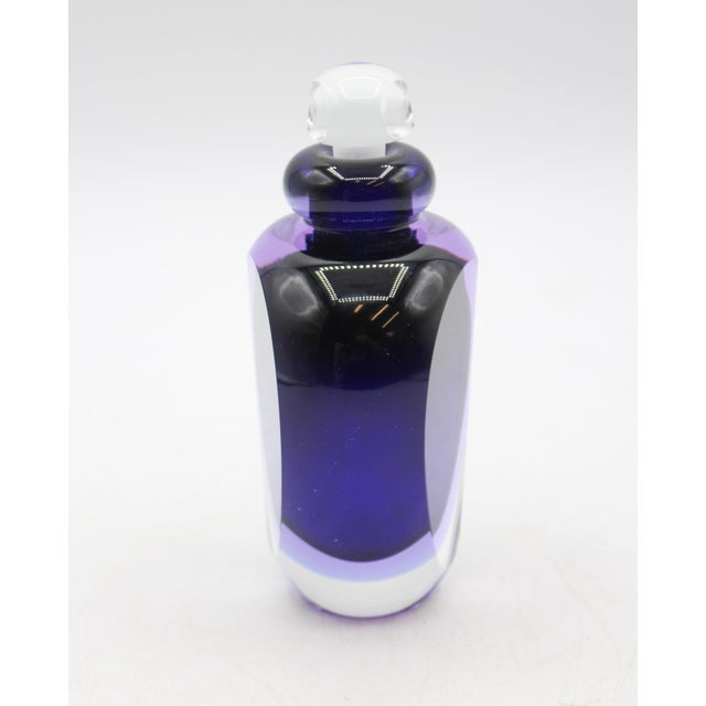 Signed James Clarke & dated 1991 glass perfume bottle, American. Cobalt in clear panelled heart studio glass. Faceted...