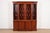 A gorgeous Georgian or Chippendale style lighted breakfront bookcase cabinet or dining cabinet By Baker Furniture,...