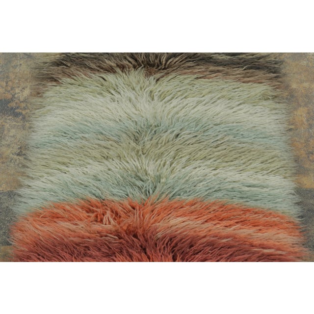 Handwoven in exotic yarn, this 1x8 contemporary extra-long runner is a vibrant addition to Rug & Kilim’s modern rug...