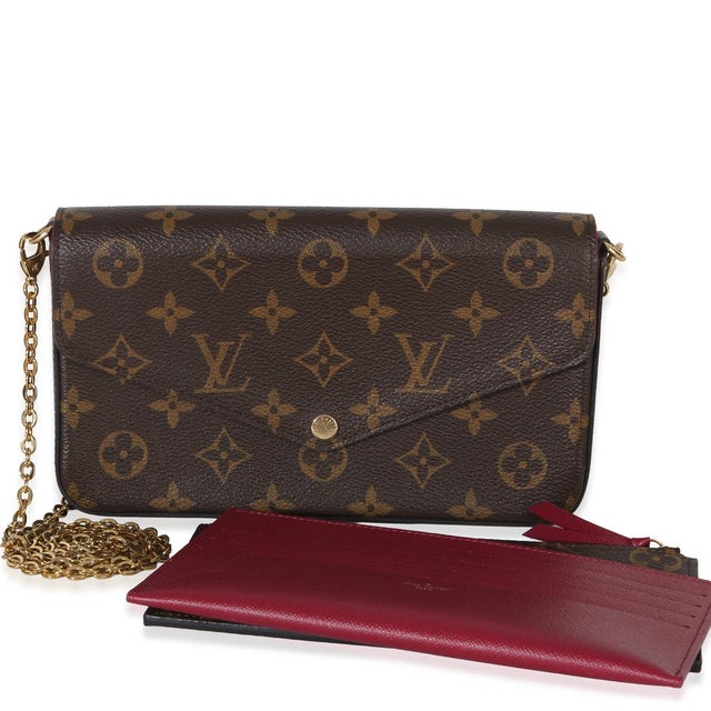 Item #: 154835 Features Interior: Two slip pockets. One zip pocket. Eight card slots Dimensions: 8.5 x 4.5 x 1 in Handbag...