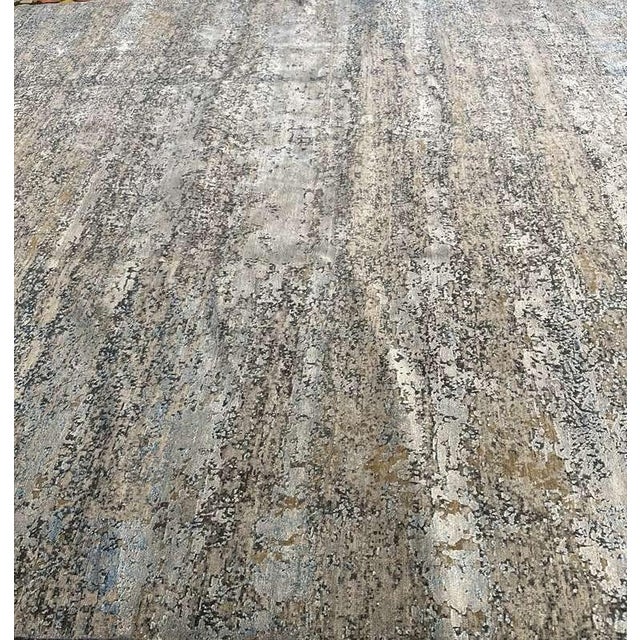 A Modern Abstract Rug in Handspun Wool This hand-knotted rug from Nepal is a refined study in texture, material, and...