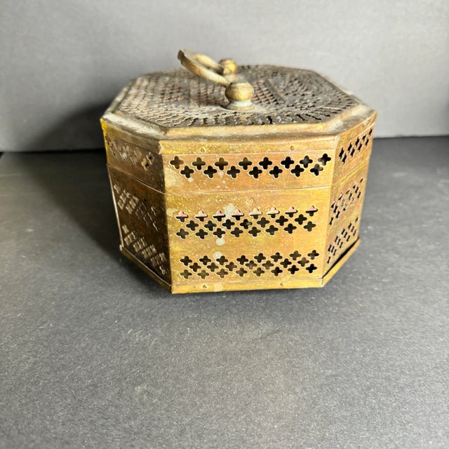 Vintage brass hinged box reticulated all over. I believe these have traditionally been used for potpourri but, you can...