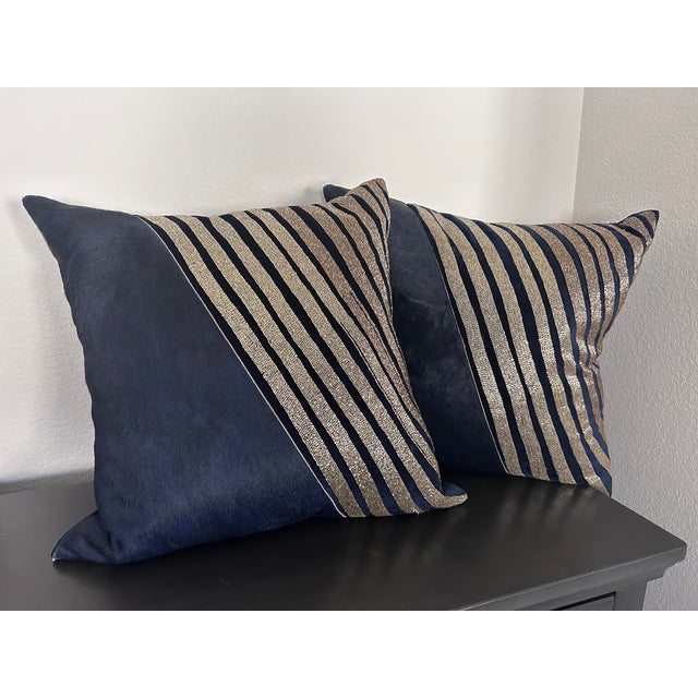 Add a dramatic, tactile statement to your sofa or bedding with this large-scale, artisan pair of designer pillows....