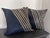 Add a dramatic, tactile statement to your sofa or bedding with this large-scale, artisan pair of designer pillows....