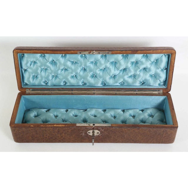 Late 19th century leather over wood french glove box. Engraved and pierced nickel decorative plate on top, robins egg blue...