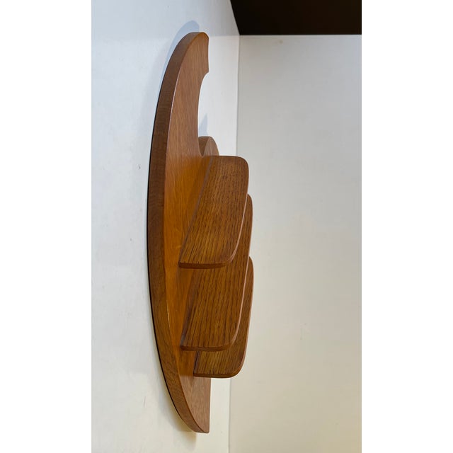 Skillfully crafted wall mounted spice-rack or display-shelf for personal smalls. Crafted by anonymous furniture maker in...