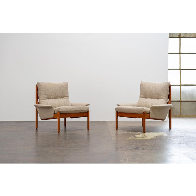 Pair of Lounge Chairs, designed by Illum Wikkelsø for Silkeborg, 1972. Solid teak wood with a curved frame. Danish design...
