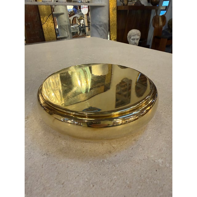 Elegant mid-century Italian brass box with matching lid, defined by its softly rounded profile and warm golden patina. The...