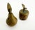 Immensely charming apple and pear form salt and pepper set made of solid brass with rich patina. Likely produced in the...