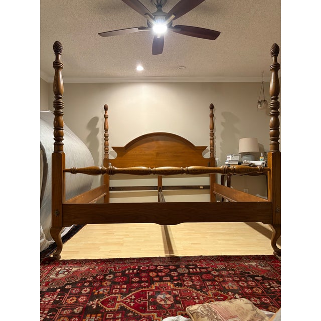 This is a pineapple post bed. It’s a very sturdy and though it is technically a king bed I have been using it with my...