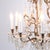 Antique Crystal Chandelier in Gilt Bronze with Louvre Style Decorations, 1920s For Sale - Image 6 of 14