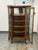 Design Plus Gallery presents an Antique Victorian Quarter-Sawn Tiger Oak Curved Glass Curio. The cabinet displays...