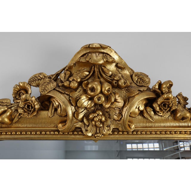 France / 1850 / Mantel Mirror / Wood and Plaster / Antique / Baroque Revival A majestic relic of mid-19th-century French...