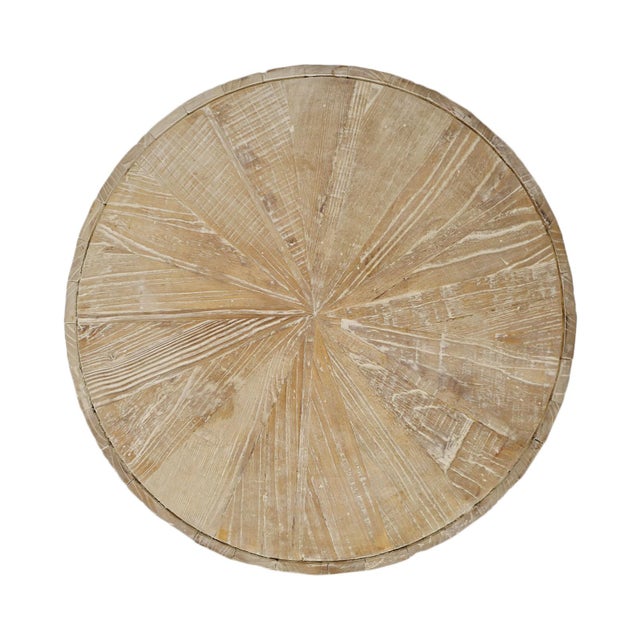 Attractive and simple modern design round reclaimed elm wood top set on black iron base. Thick top showcases grain with...