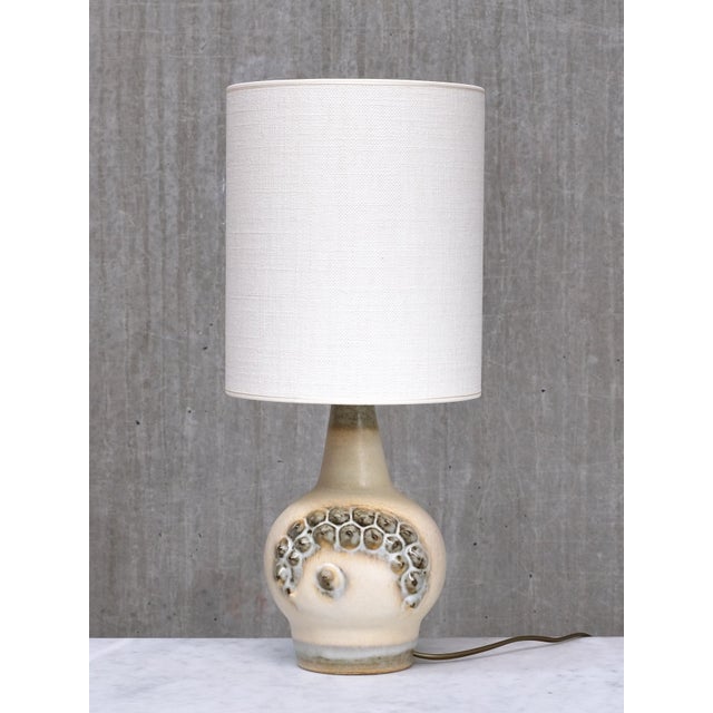 This rare pair of table lamps was designed by Einar Johansen and produced by Søholm in Denmark in the 1960s. The model is...