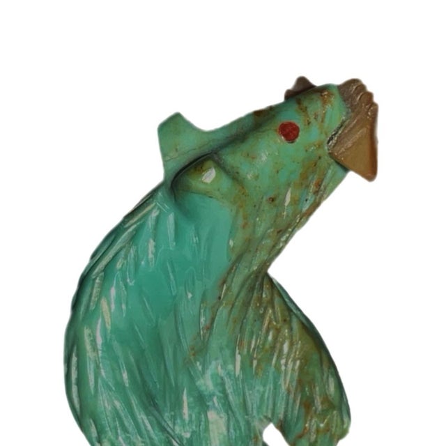 Tiny talisman of a standing bear is carved from (probably) Turquoise (possibly Howlite), with red inlaid coral eyes and a...