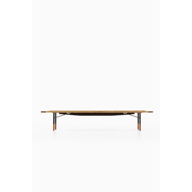 The bo101 bench, designed by finn juhl and produced by bovirke in denmark in 1953, represents a refined synthesis of...