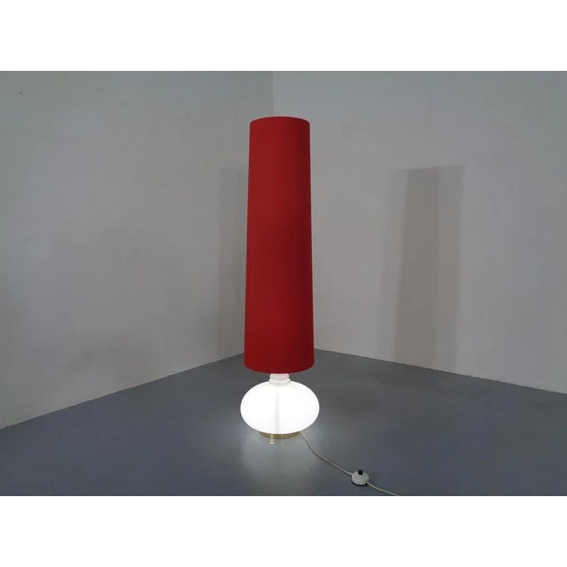 Large floor lamp with illuminated glass base. You can turn on the lamp three times. Only the foot. Only the screen, or...