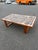 Mid century Danish coffee table. The table is made by Trioh in Denmark with a stunning Ox Art tile inlay design. The table...