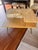 Set of 2 Mid-Century Modern Tiered Coffee Tables, photos attached. These cerca 1950s tiered coffee tables have a light...