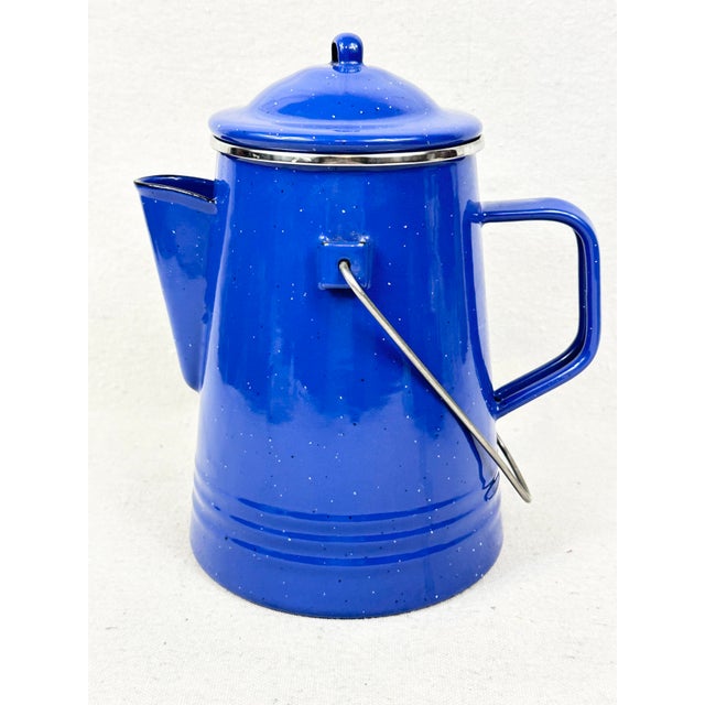 Add a touch of rustic nostalgia to your kitchen, cabin, or next outdoor adventure with this classic vintage enamelware...
