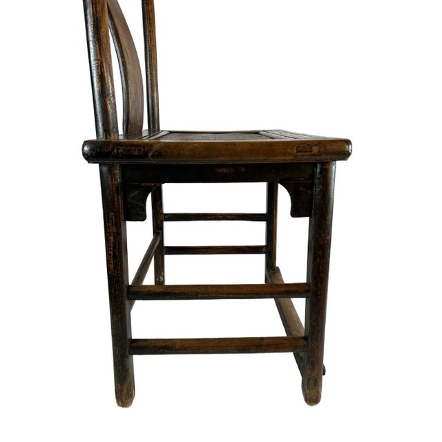 The chair is a sturdy, well made, using a series of joinery that has withstood the test of times. It has a high back, with...