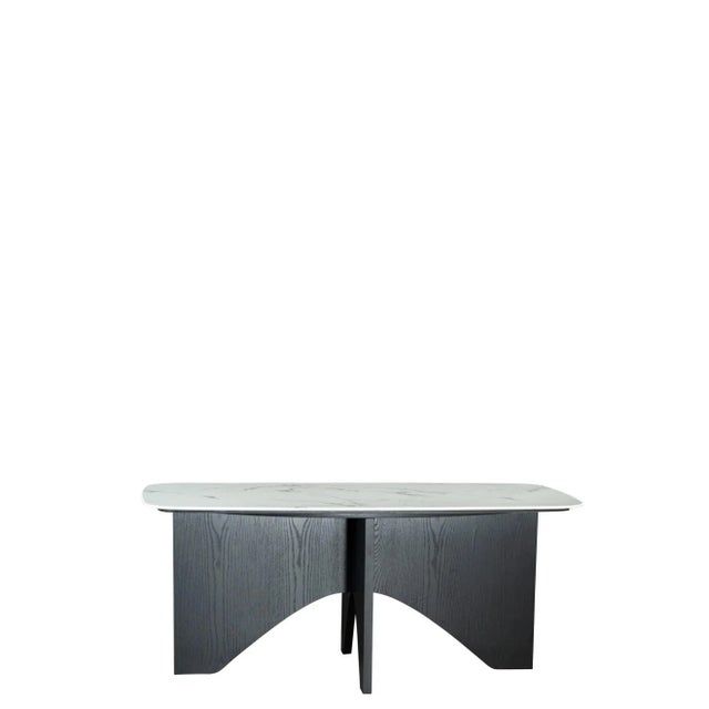 Sophisticated materials take a cue from modern geometry to create this spectacular dining table. Black color wood base...