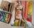 A seated nude rendered in the warm, sun-drenched palette of the Mediterranean. Painted in an expressive, modernist style,...