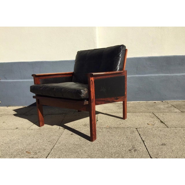 This lounge chair No. 4 or the Capella chair was designed by Illum Wikkelsø in 1959 and manufactured by Niels Erik...