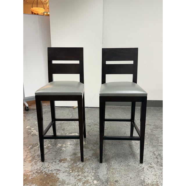 Design Plus Gallery presents a Pair of Archipel Leather Barstools by Christian Liaigre (1943-2020) for Holly Hunt. These...