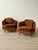 Mid-century lounge chair, newly reupholstered in chocolate brown chenille. The chair has a geometric silhouette defined by...