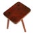 This restored tripod stool is made of wax-polished chestnut.