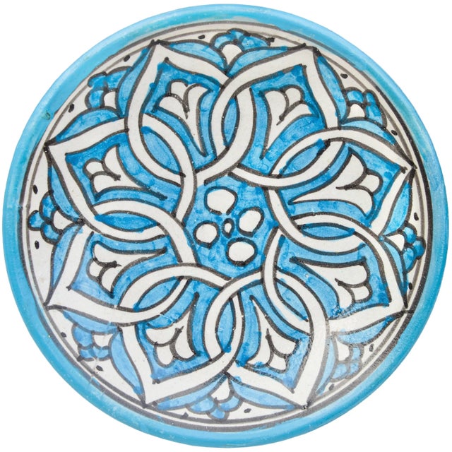One-of-a-kind antique handcrafted and glazed Moroccan ceramic plate. Featuring an elaborate hand-painted blue and white...