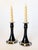 Stunning pair of Art Deco style rich noir black glass candlestick holders with the smoothest curves and finish. These...