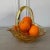 A delicate-looking and pretty fruit basket, this Tiara yellow glass basket is actually very sturdy for fruit or any kind...