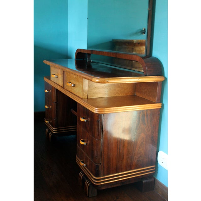 This original Italian Art Deco dressing table is entirely veneered with precious essences such as rosewood and bird's-eye...