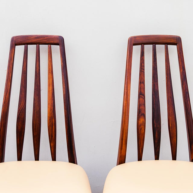A perfectly restored set of four “Eva” chairs in Brazilian rosewood by Niels Koefoed, produced in Denmark in c 1970s by...